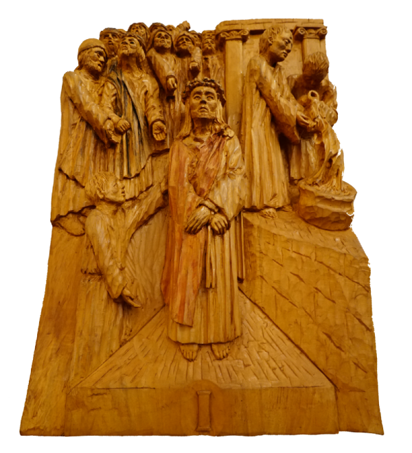 Handmade wooden carving of station 1