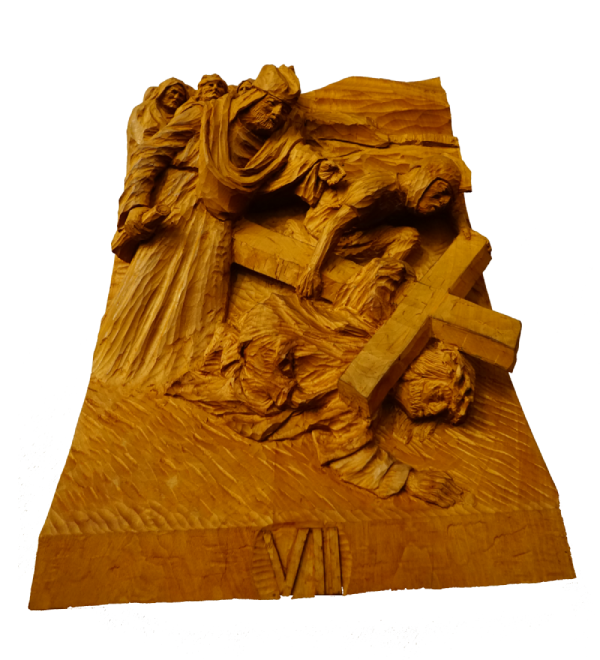 Handmade wooden carving of station 7