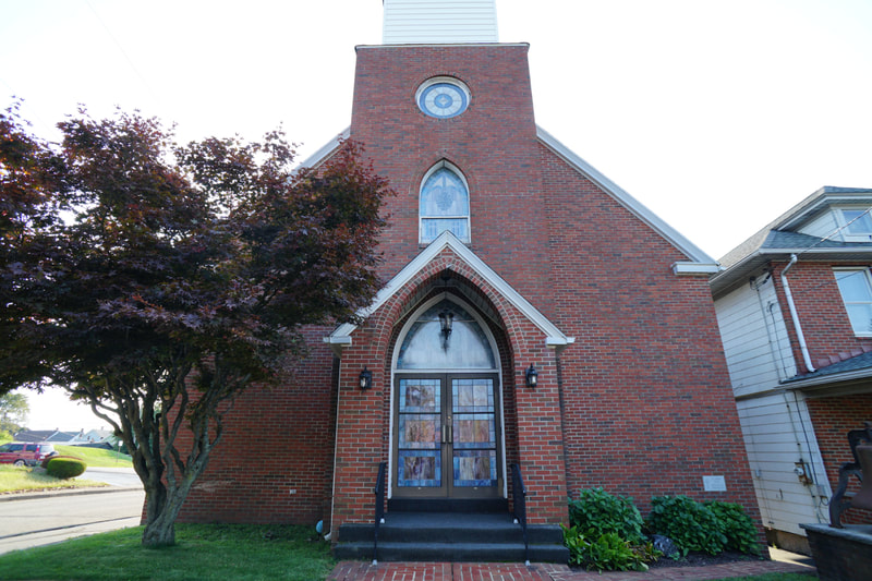 Exterior photo of the church entrance